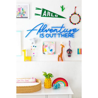 spotted! our giraffe bank adds a pop of color to this colorful nursery