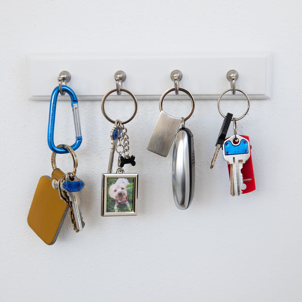 Pearhead's square keychain with bone charm