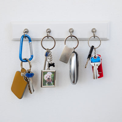 Pearhead's square keychain with bone charm