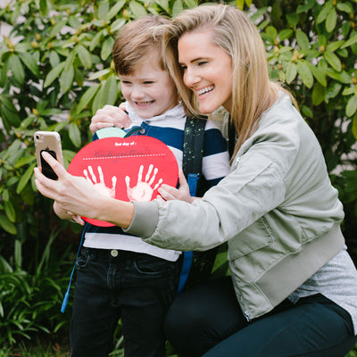 Pearhead's first day of school apple handprint sign
